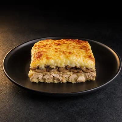 Запеканка из мяса с картофельным пюре и грибами — порция 350 г